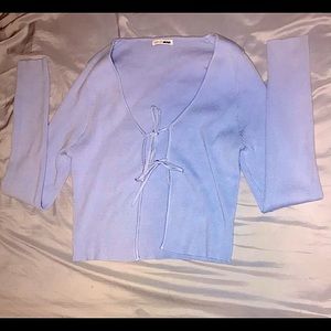 Sweater from Fashion Nova called "Heart Of Gold"